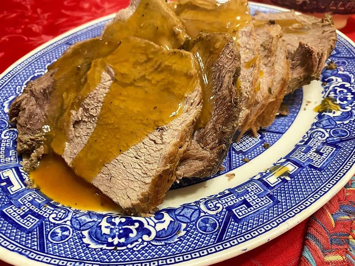 Serving Sirloin Roast with Brown Gravy on Blue Willow Platter