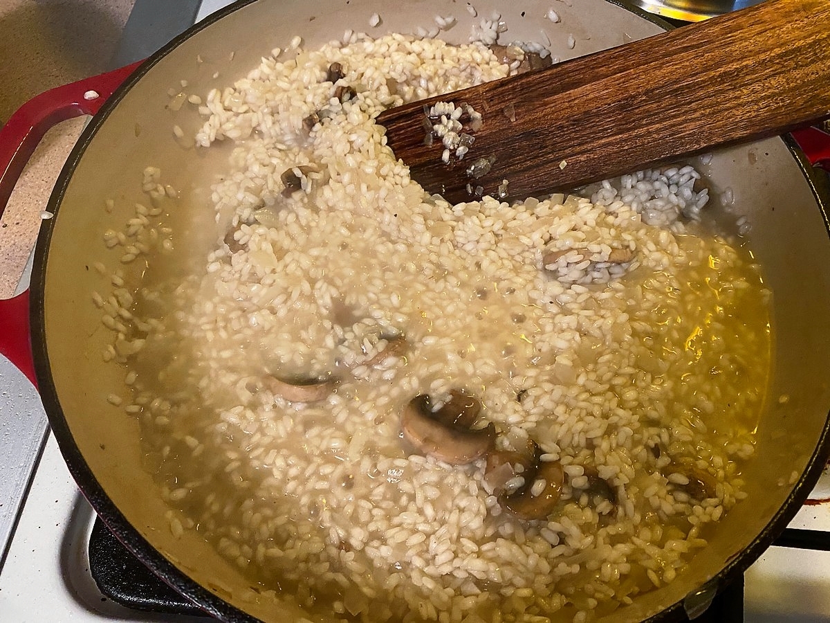Begin Adding Broth to the Rice, Stirring Frequently