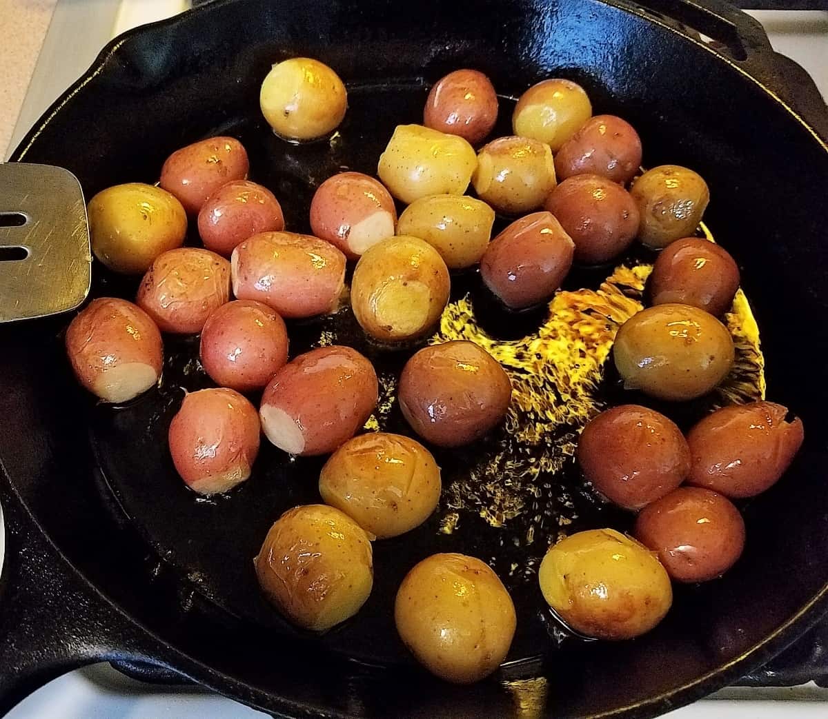 Fry the Boiled Potatoes in a Hot Skillet with Oil