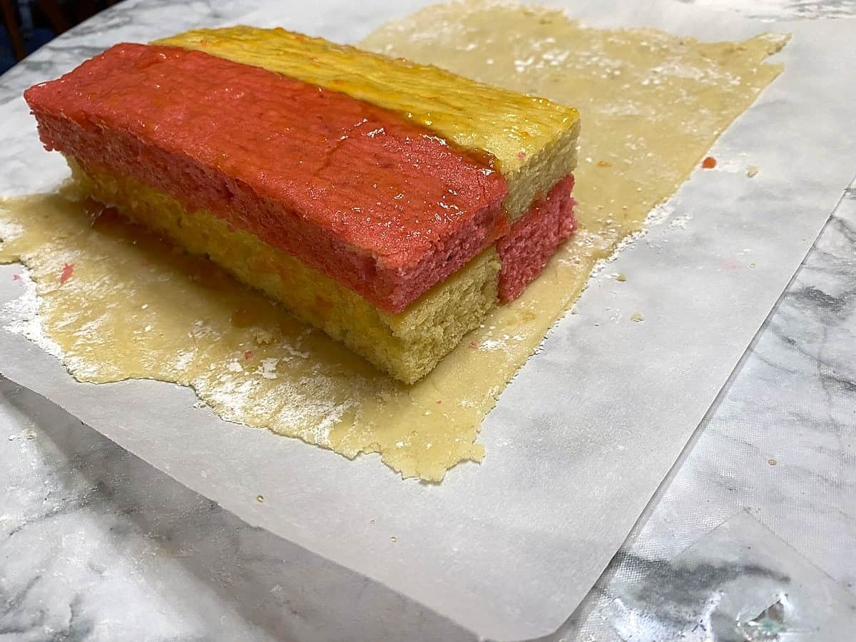 Place Cake on Rolled Out Marzipan