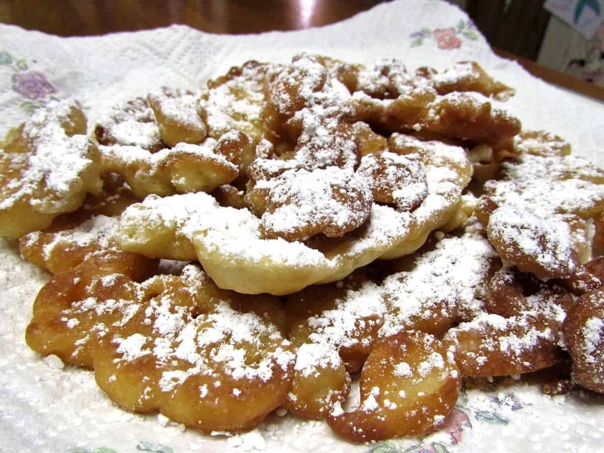 Sprinkle Lots of Powdered Sugar on the Fried Cakes