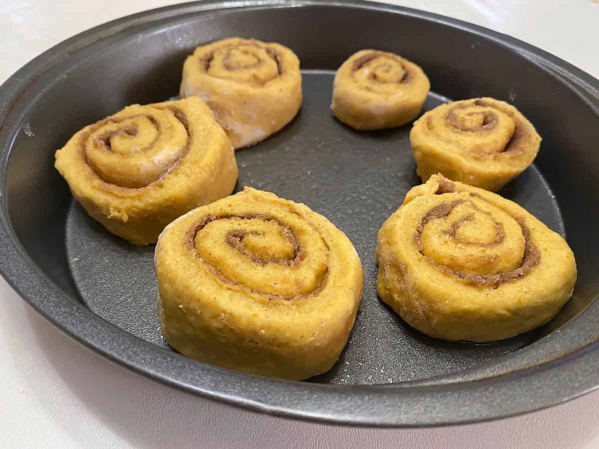 Place Sliced Rolls in Prepared Pans