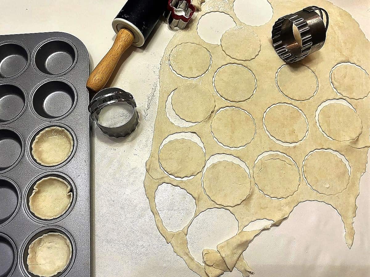 Cut out Bottoms of Tarts with a Biscuit Cutter