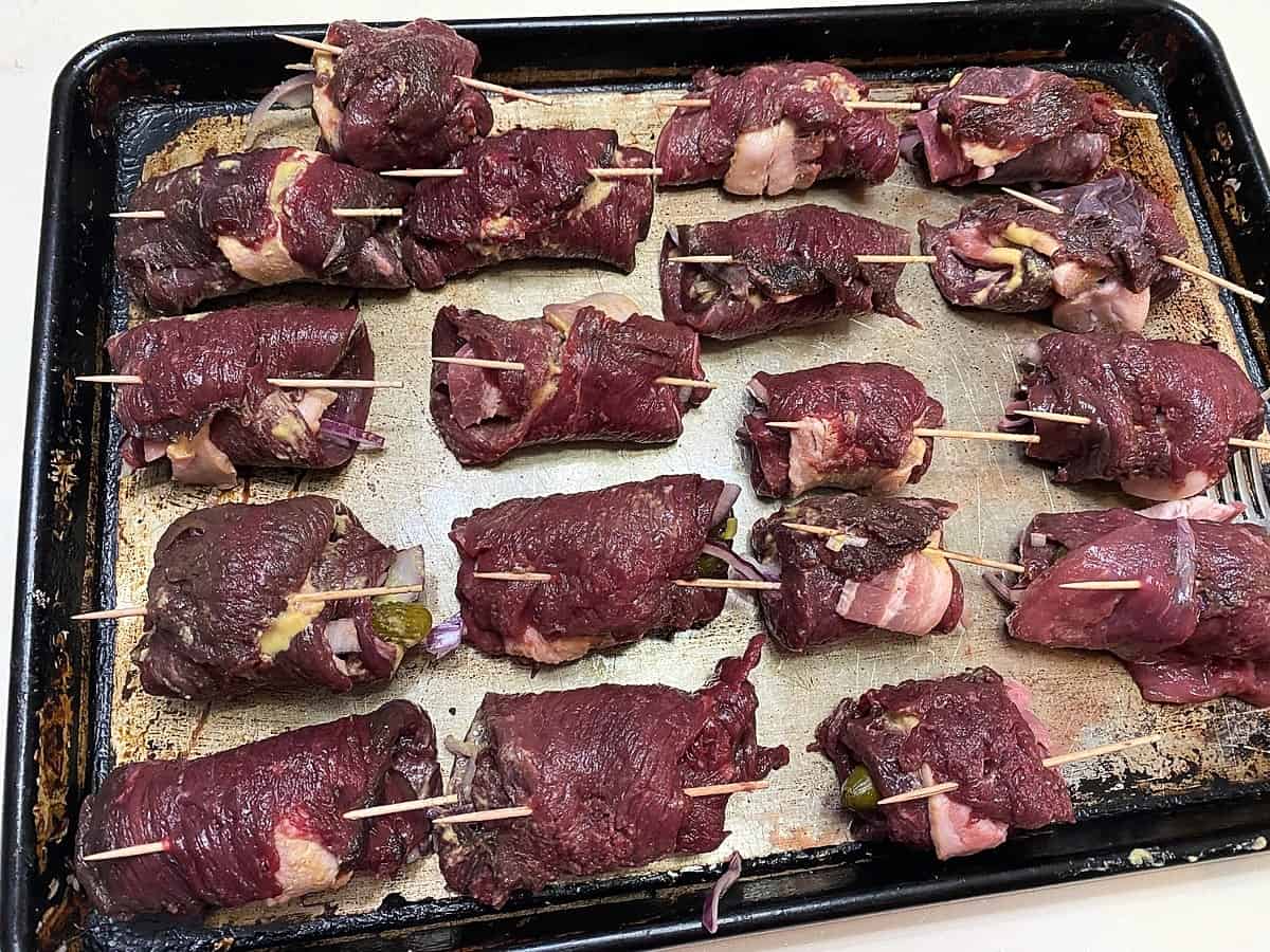 Roll Strips of Venison and Place on a Baking Sheet