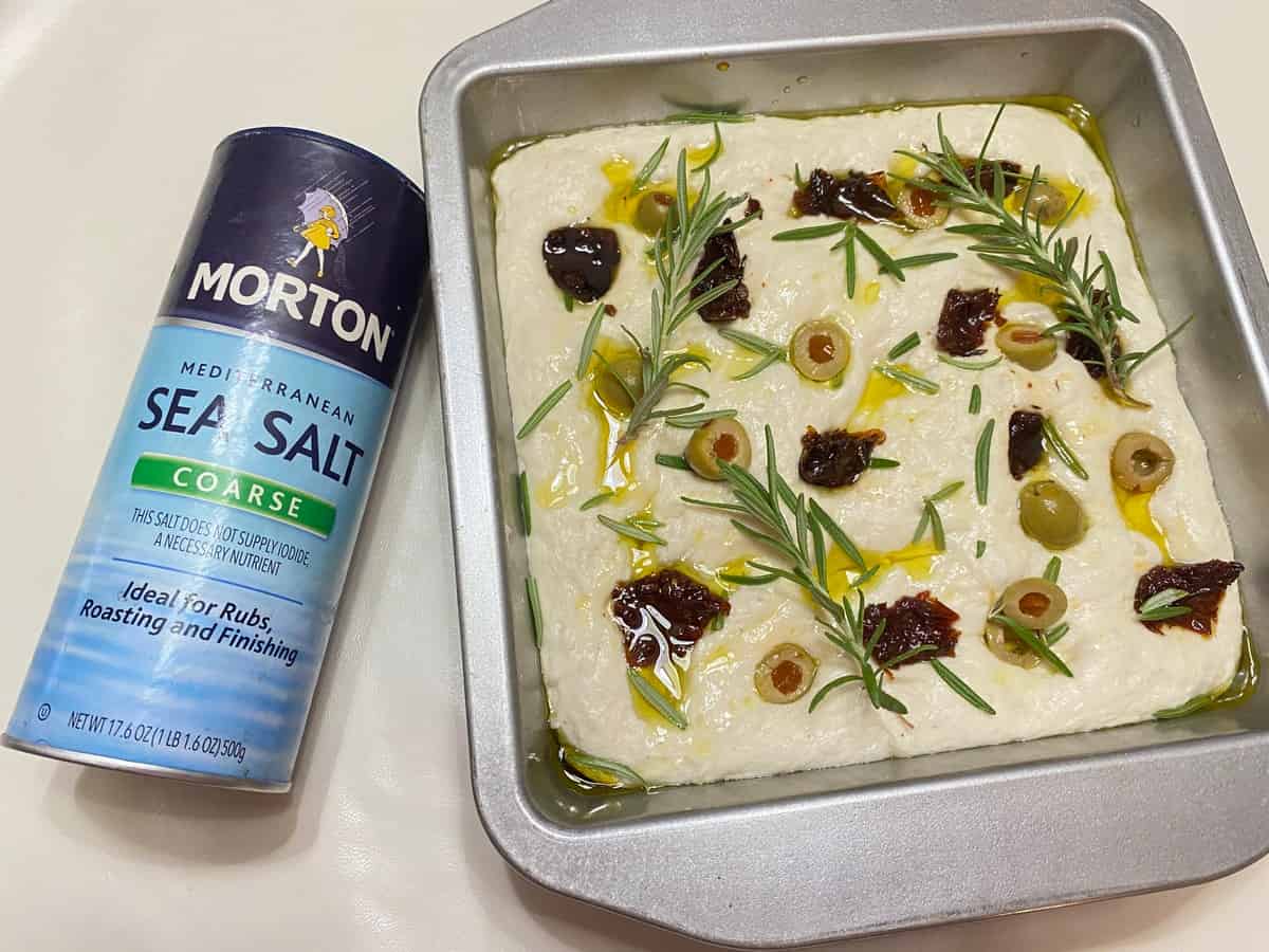 Decorate the Top with Olives, Sun-Dried Tomatoes, and Herbs