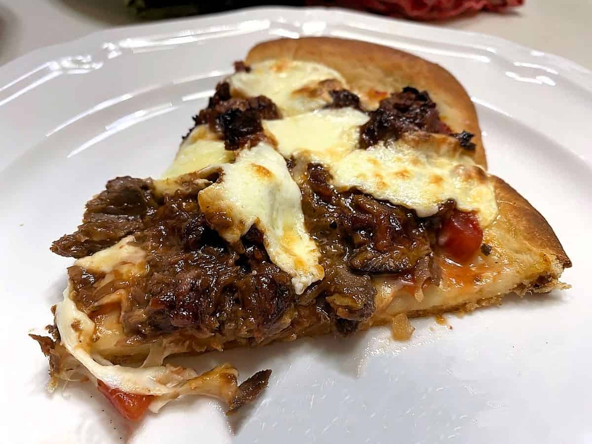 Sliced Pizza with Lots of Barbecued Beef