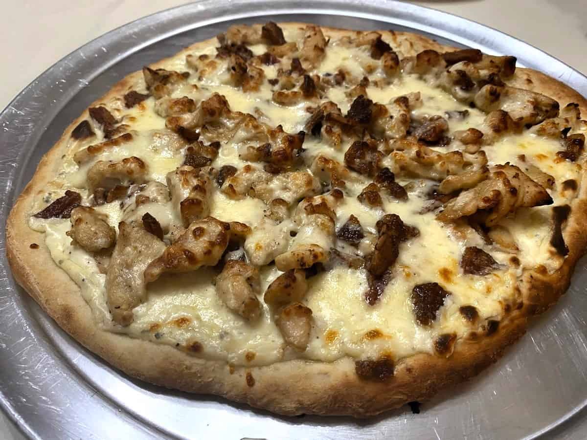 Allow Chicken Bacon Ranch Pizza to Bake until Cheese and Sauce is Golden Brown