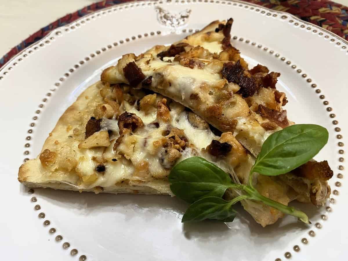Two Slices of Chicken Ranch Pizza Served on Pfaltzgraff Farmhouse Hen Plates