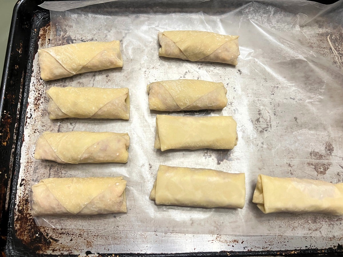 Place Rolled Egg Rolls on a Baking Sheet Lined with Waxed Paper