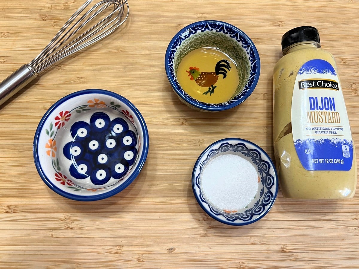 Whisk Cider Vinegar, Granulated Sugar, and Dijon Mustard